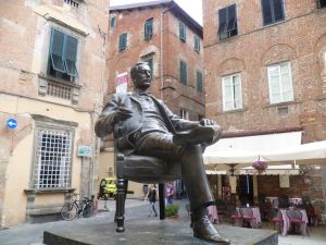 Puccini outside his house